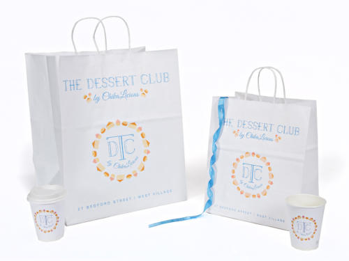 The Desert Club by ChikaLicious Classic Shopping Bags Wave Cups Custom Printed Ribbon Wave Cups Hot Cups Printed Coordinated Packaging Paper Shopping Bag Recycled Shopping Bag Upscale Packaging Design Twisted Paper Handled Shopping Bag, White Shopping Bag Natural Kraft Paper Shopping Bags Recycled And Recyclable FSC Certified Paper